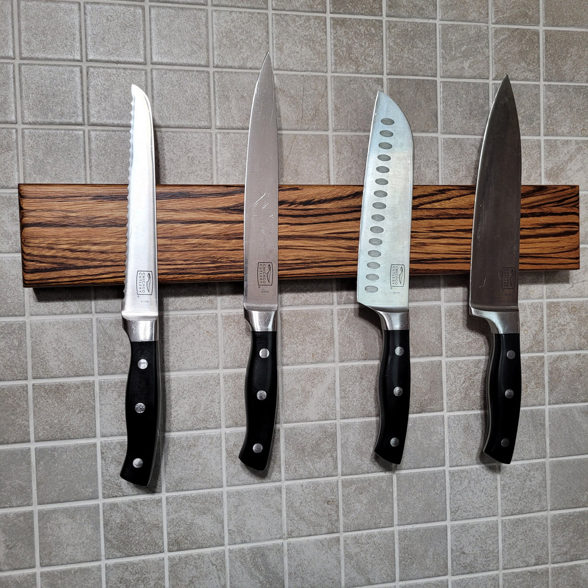 http://llbwoodworx.com/cdn/shop/products/ZebrawoodMagneticKnifeHolder_1200x1200.jpg?v=1666819890